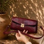 کیف چرم زنانه | زرشکی ابر و بادی سنگی