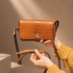 کیف چرم زنانه | عسلی نارنجی ابر و بادی سنگی | چرم اصل گاوی