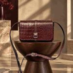 کیف چرم بغل پرچ زرشکی ابر و بادی سنگی | چرم اصل گاوی